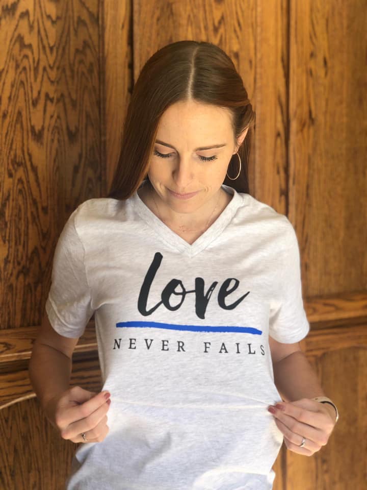 Love Never Fails © Unisex V-Neck Top (Ash Gray + TBL)