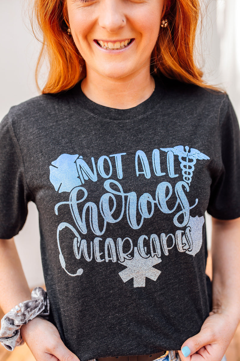 Not All Heroes Wear Capes © Unisex Top (Ombré Glitter)