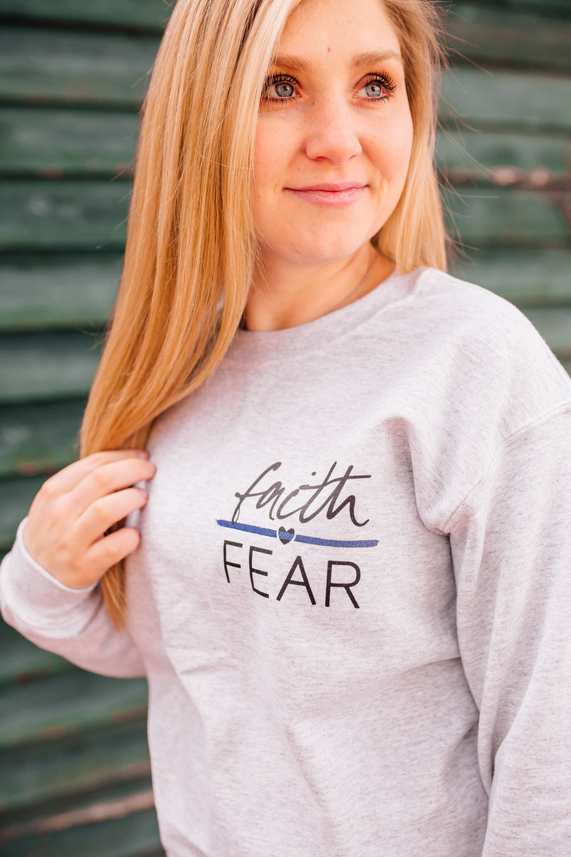 Faith Over Fear © Pocket Print Unisex Crewneck Sweatshirt (Thin Blue Line)