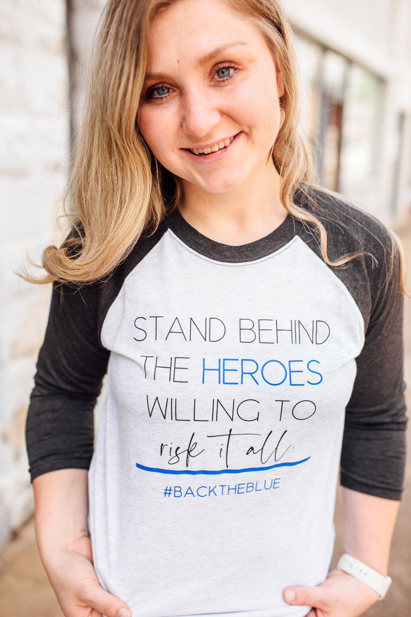 Stand Behind The Heroes Willing To Risk It All © Unisex Baseball Raglan (Black + Royal Blue)