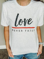 Love Never Fails © Unisex Top (Thin Red Line)
